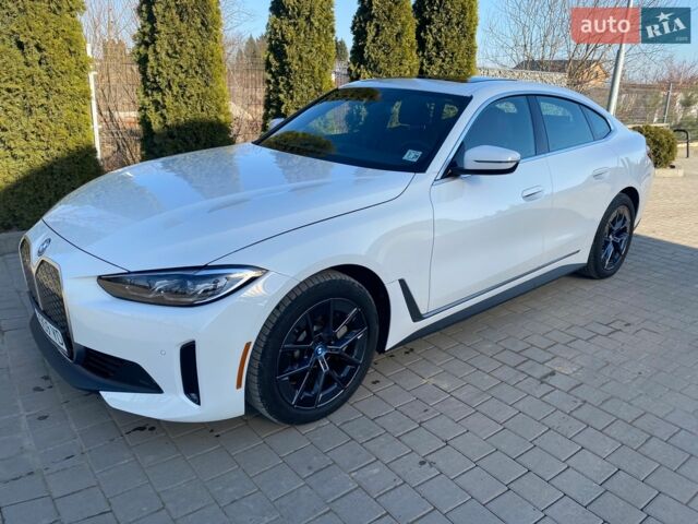 Белый БМВ i4, объемом двигателя 0 л и пробегом 22 тыс. км за 35000 $, фото 1 на Automoto.ua