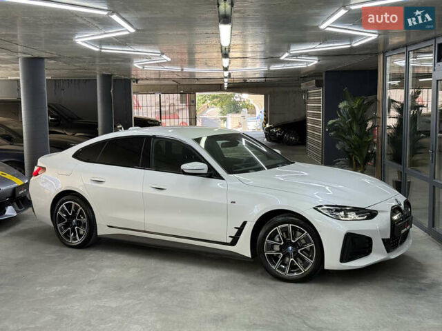 Белый БМВ i4, объемом двигателя 0 л и пробегом 11 тыс. км за 39500 $, фото 1 на Automoto.ua