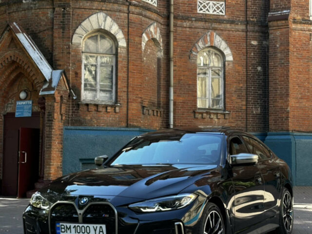 Черный БМВ i4, объемом двигателя 0 л и пробегом 33 тыс. км за 48000 $, фото 1 на Automoto.ua