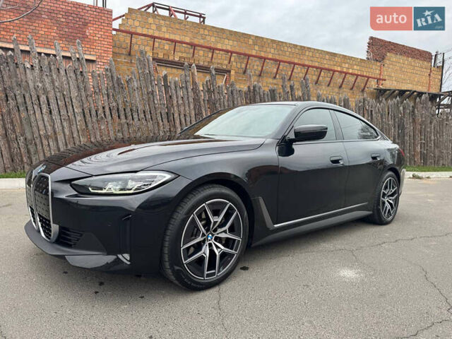 Черный БМВ i4, объемом двигателя 0 л и пробегом 19 тыс. км за 31999 $, фото 1 на Automoto.ua