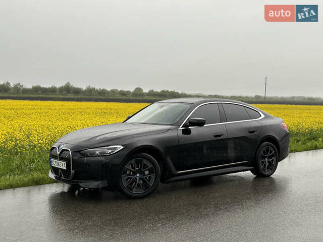 Черный БМВ i4, объемом двигателя 0 л и пробегом 7 тыс. км за 38200 $, фото 1 на Automoto.ua