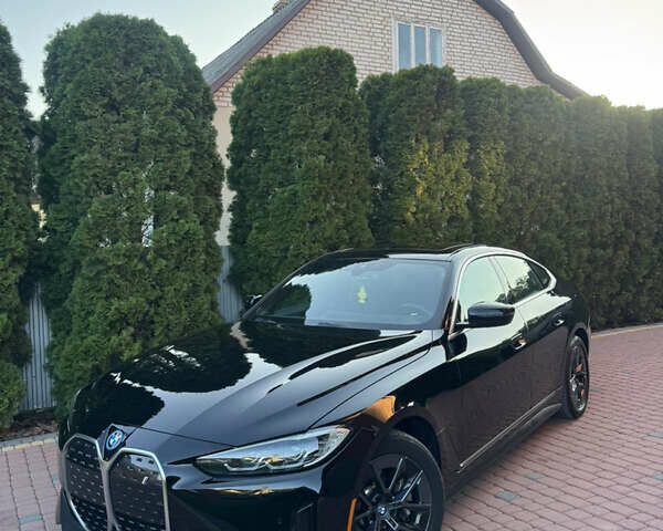 Черный БМВ i4, объемом двигателя 0 л и пробегом 24 тыс. км за 26200 $, фото 1 на Automoto.ua