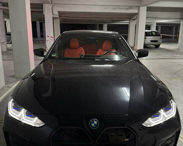 Черный БМВ i4, объемом двигателя 0 л и пробегом 23 тыс. км за 51500 $, фото 1 на Automoto.ua