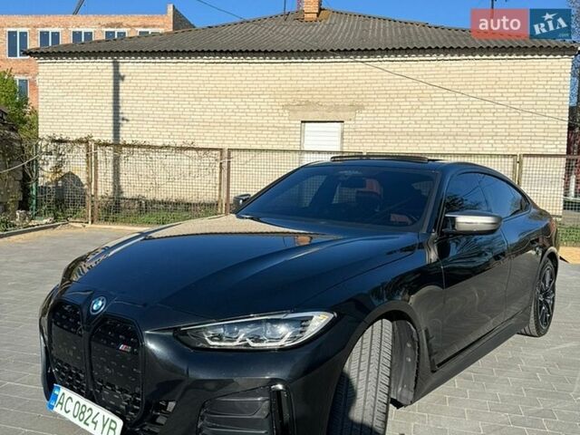 Черный БМВ i4, объемом двигателя 0 л и пробегом 50 тыс. км за 41000 $, фото 1 на Automoto.ua