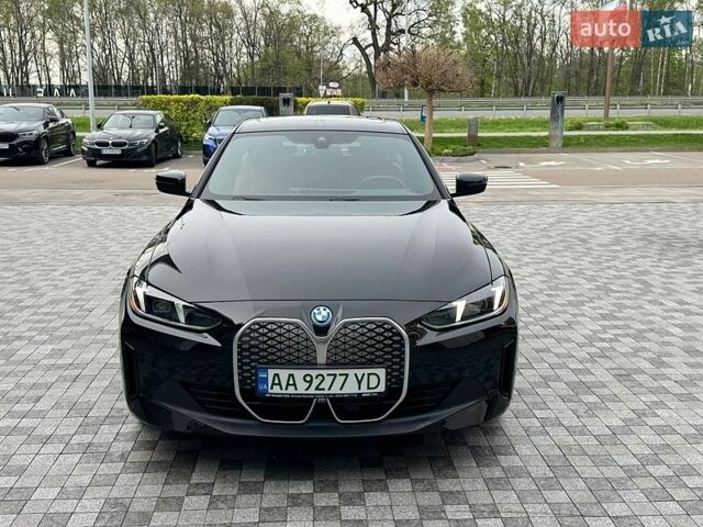 Черный БМВ i4, объемом двигателя 0 л и пробегом 2 тыс. км за 44500 $, фото 1 на Automoto.ua