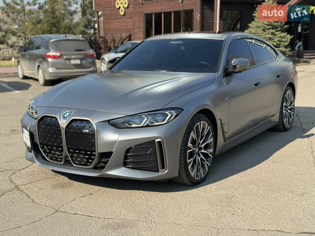 Серый БМВ i4, объемом двигателя 0 л и пробегом 22 тыс. км за 59900 $, фото 1 на Automoto.ua