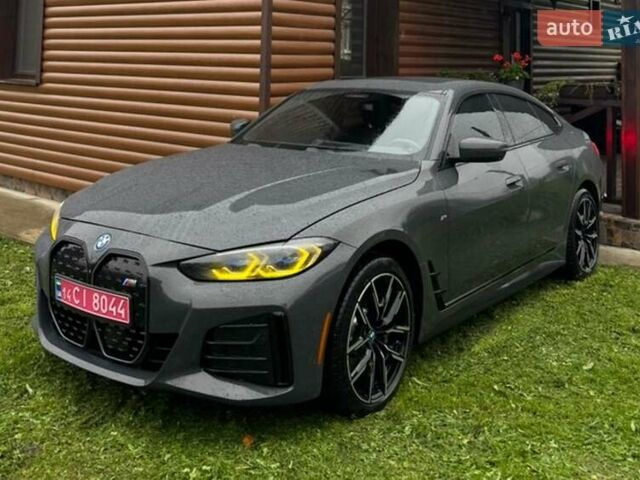 Серый БМВ i4, объемом двигателя 0 л и пробегом 22 тыс. км за 39500 $, фото 1 на Automoto.ua