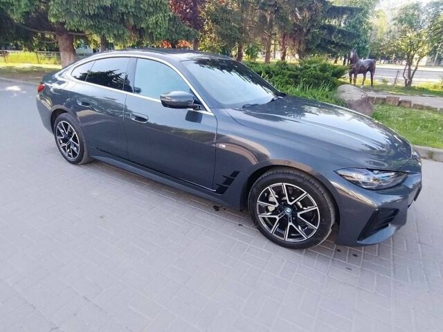 Серый БМВ i4, объемом двигателя 0 л и пробегом 75 тыс. км за 38900 $, фото 1 на Automoto.ua