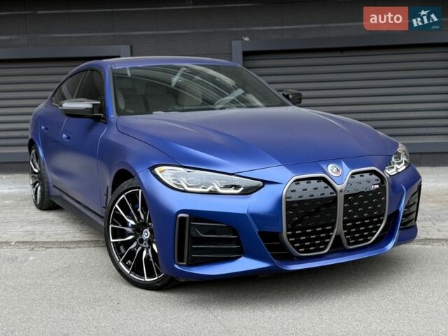 Синий БМВ i4, объемом двигателя 0 л и пробегом 19 тыс. км за 41900 $, фото 1 на Automoto.ua