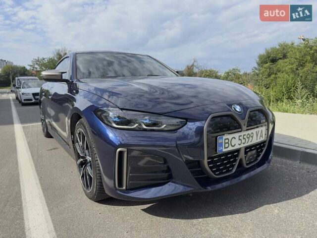 Синий БМВ i4, объемом двигателя 0 л и пробегом 54 тыс. км за 44500 $, фото 1 на Automoto.ua
