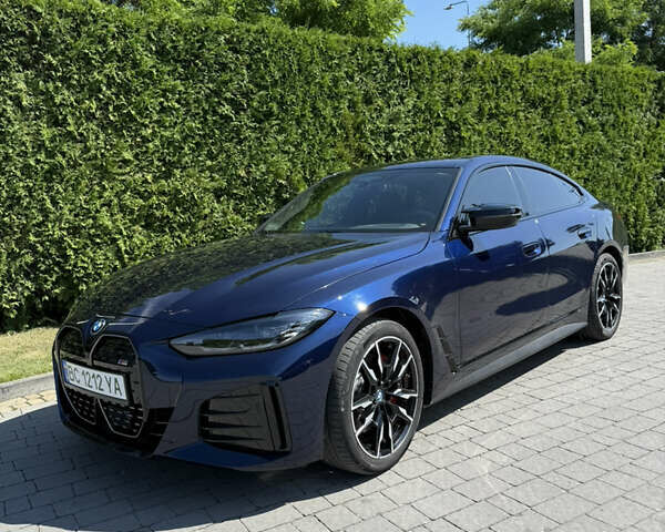 Синий БМВ i4, объемом двигателя 0 л и пробегом 12 тыс. км за 43000 $, фото 1 на Automoto.ua