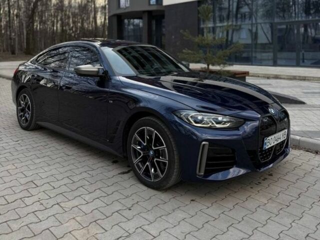 Синий БМВ i4, объемом двигателя 0 л и пробегом 51 тыс. км за 44000 $, фото 1 на Automoto.ua