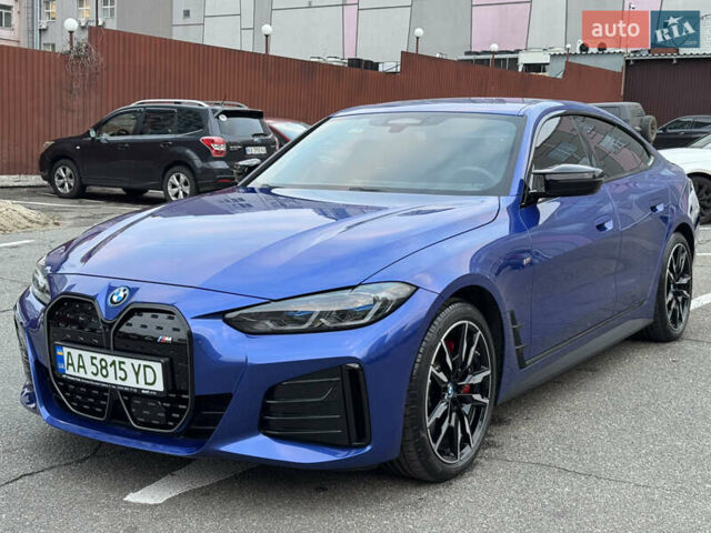 Синий БМВ i4, объемом двигателя 0 л и пробегом 10 тыс. км за 60000 $, фото 1 на Automoto.ua