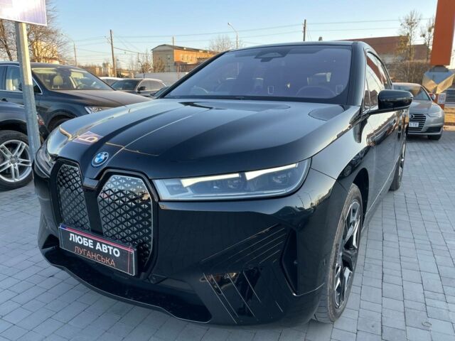 Черный БМВ iX, объемом двигателя 0 л и пробегом 14 тыс. км за 67300 $, фото 1 на Automoto.ua