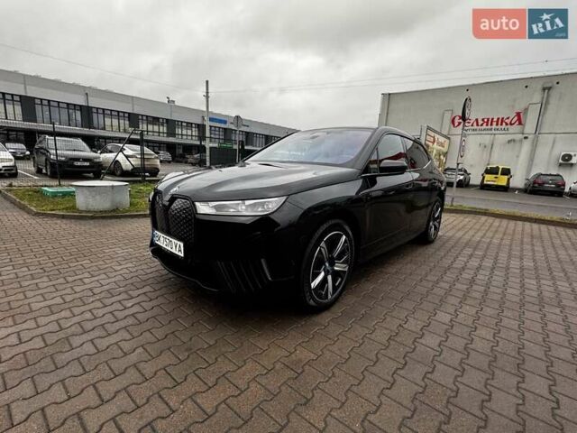 Черный БМВ iX, объемом двигателя 0 л и пробегом 27 тыс. км за 58500 $, фото 1 на Automoto.ua
