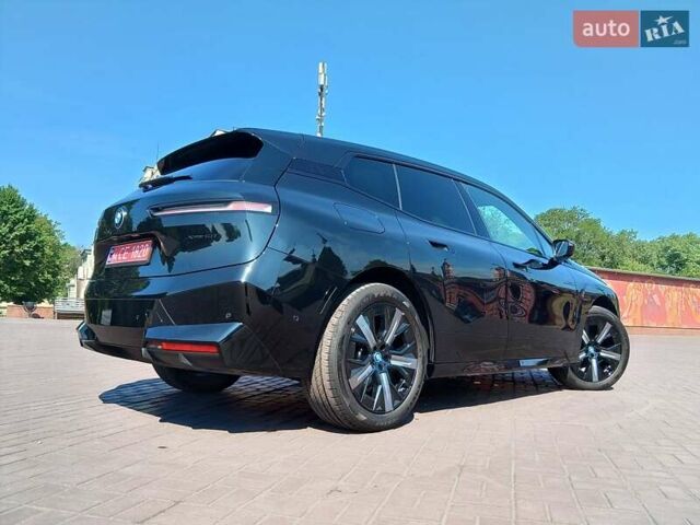Черный БМВ iX, объемом двигателя 0 л и пробегом 9 тыс. км за 60999 $, фото 1 на Automoto.ua