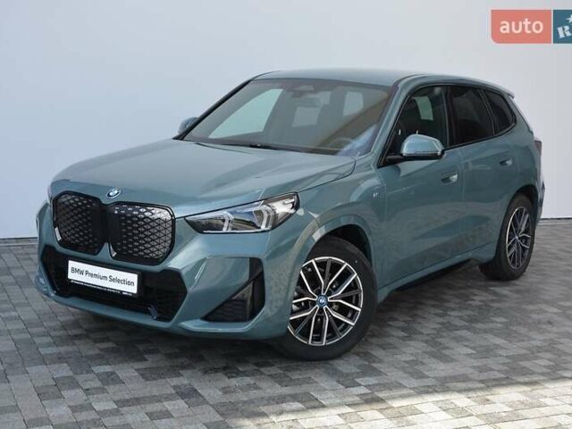 Зеленый БМВ iX1, объемом двигателя 0 л и пробегом 9 тыс. км за 41589 $, фото 1 на Automoto.ua