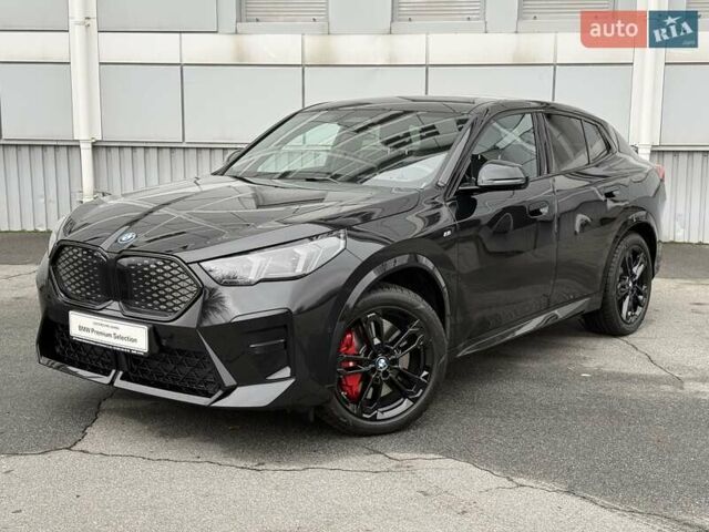 Черный БМВ iX2, объемом двигателя 0 л и пробегом 2 тыс. км за 53666 $, фото 1 на Automoto.ua