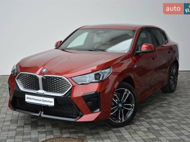Красный БМВ iX2, объемом двигателя 0 л и пробегом 9 тыс. км за 53143 $, фото 1 на Automoto.ua