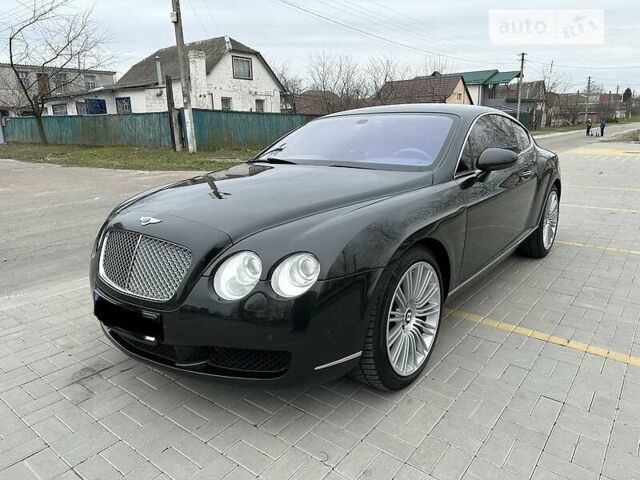 Чорний Бентлі Continental GT, об'ємом двигуна 6 л та пробігом 153 тис. км за 24700 $, фото 1 на Automoto.ua