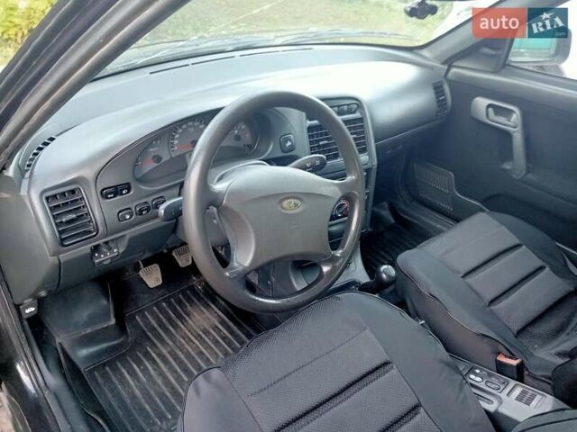 Черный Богдан 2111, объемом двигателя 1.6 л и пробегом 182 тыс. км за 2500 $, фото 1 на Automoto.ua