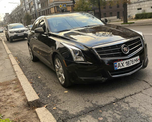 Чорний Каділак АТС, об'ємом двигуна 2 л та пробігом 156 тис. км за 12900 $, фото 1 на Automoto.ua