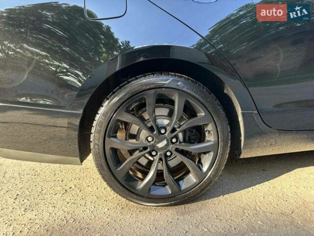 Черный Кадиллак АТС, объемом двигателя 2.46 л и пробегом 145 тыс. км за 10990 $, фото 1 на Automoto.ua
