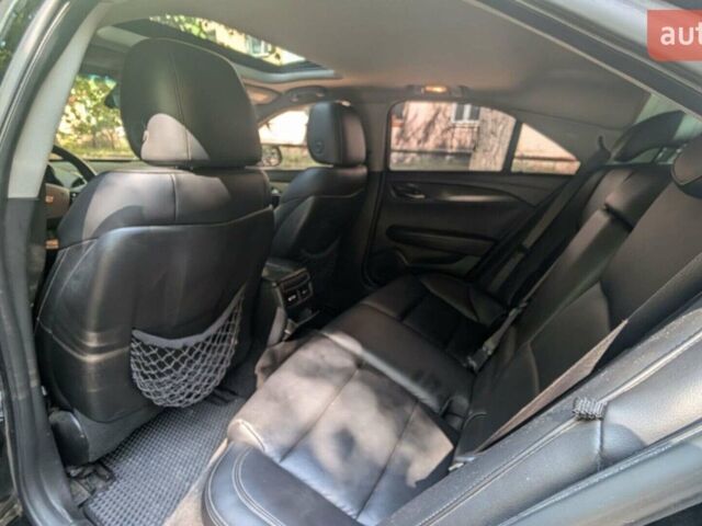 Чорний Каділак АТС, об'ємом двигуна 2.46 л та пробігом 135 тис. км за 11500 $, фото 1 на Automoto.ua