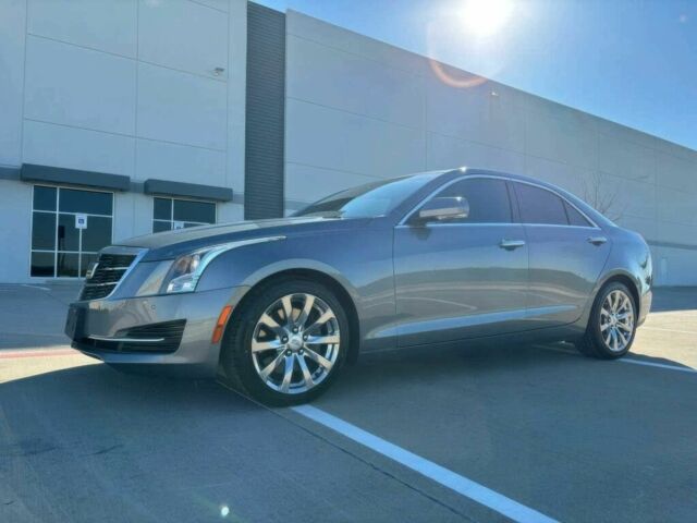 Серый Кадиллак АТС, объемом двигателя 2 л и пробегом 37 тыс. км за 2650 $, фото 1 на Automoto.ua