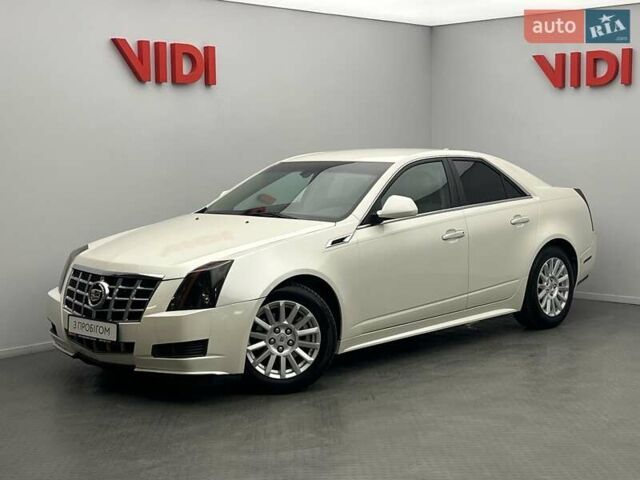 Білий Каділак CTS, об'ємом двигуна 3 л та пробігом 165 тис. км за 8265 $, фото 1 на Automoto.ua