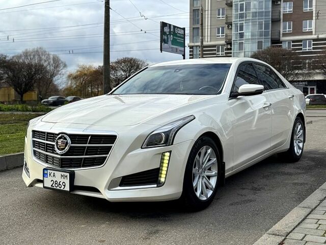 Белый Кадиллак СТС, объемом двигателя 2 л и пробегом 240 тыс. км за 13500 $, фото 1 на Automoto.ua