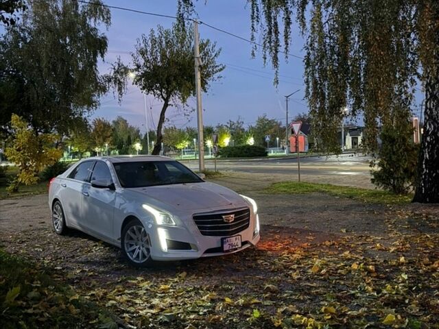 Белый Кадиллак СТС, объемом двигателя 2 л и пробегом 207 тыс. км за 14000 $, фото 1 на Automoto.ua