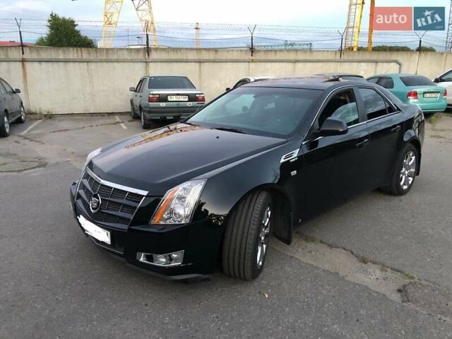 Черный Кадиллак СТС, объемом двигателя 3.6 л и пробегом 235 тыс. км за 6000 $, фото 1 на Automoto.ua