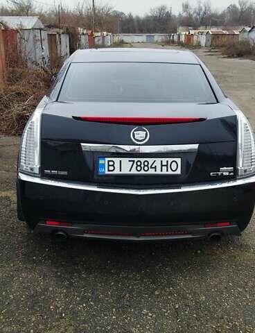 Черный Кадиллак СТС, объемом двигателя 3.6 л и пробегом 235 тыс. км за 7000 $, фото 1 на Automoto.ua