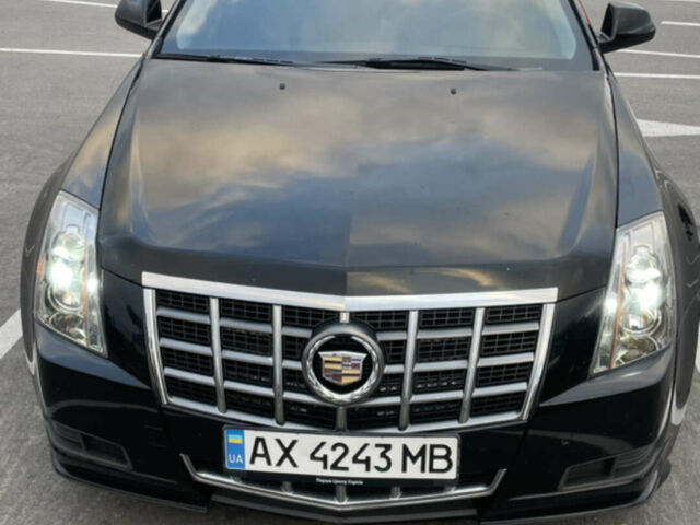 Чорний Каділак CTS, об'ємом двигуна 3 л та пробігом 168 тис. км за 9000 $, фото 1 на Automoto.ua