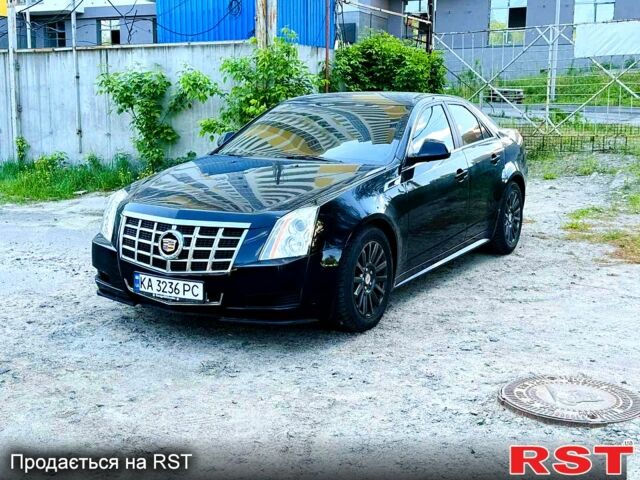 Чорний Каділак CTS, об'ємом двигуна 3 л та пробігом 203 тис. км за 7700 $, фото 1 на Automoto.ua
