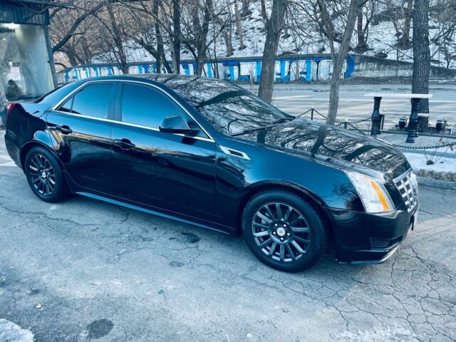Черный Кадиллак СТС, объемом двигателя 3 л и пробегом 240 тыс. км за 8800 $, фото 1 на Automoto.ua