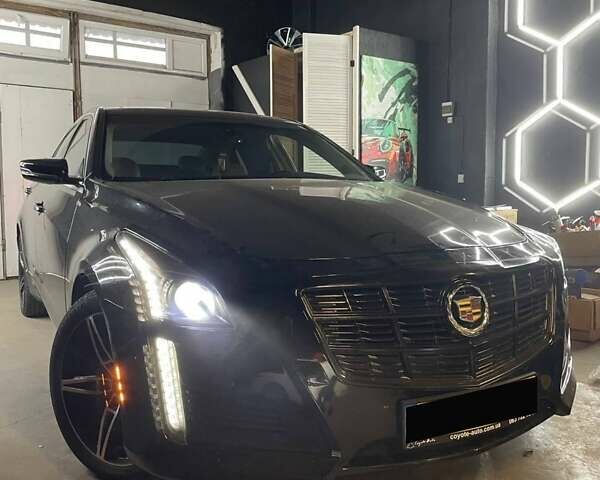 Чорний Каділак CTS, об'ємом двигуна 2 л та пробігом 172 тис. км за 12900 $, фото 1 на Automoto.ua