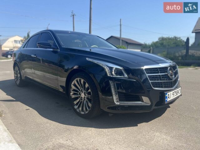 Чорний Каділак CTS, об'ємом двигуна 2 л та пробігом 101 тис. км за 17500 $, фото 1 на Automoto.ua