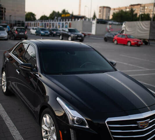 Черный Кадиллак СТС, объемом двигателя 2 л и пробегом 114 тыс. км за 14900 $, фото 1 на Automoto.ua
