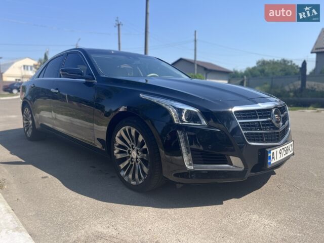 Чорний Каділак CTS, об'ємом двигуна 2 л та пробігом 101 тис. км за 17500 $, фото 1 на Automoto.ua