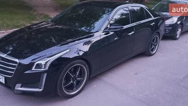 Чорний Каділак CTS, об'ємом двигуна 2 л та пробігом 140 тис. км за 15700 $, фото 1 на Automoto.ua