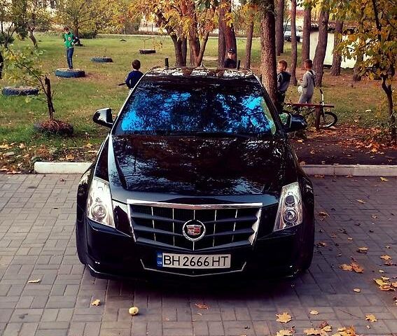 Чорний Каділак CTS, об'ємом двигуна 3 л та пробігом 100 тис. км за 9000 $, фото 1 на Automoto.ua