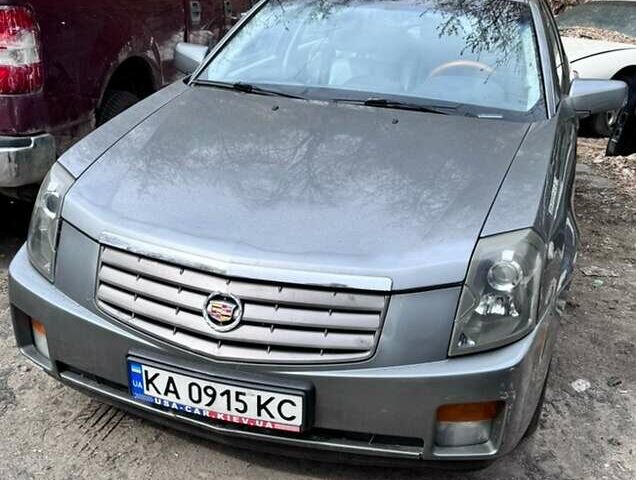Серый Кадиллак СТС, объемом двигателя 3.2 л и пробегом 139 тыс. км за 5500 $, фото 1 на Automoto.ua