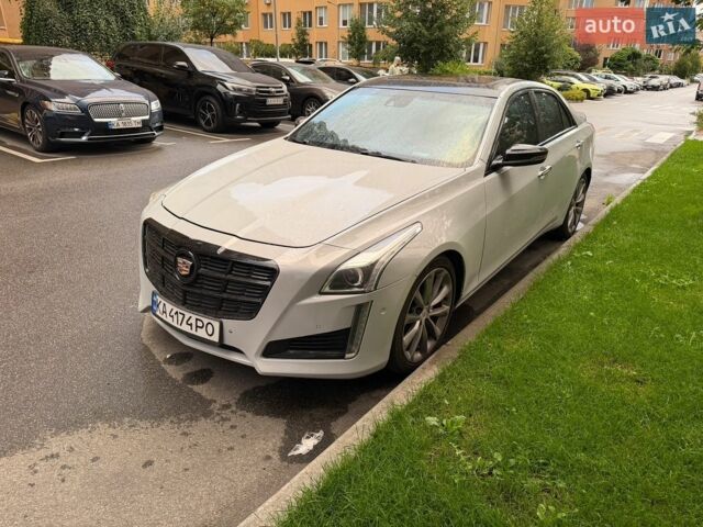 Серый Кадиллак СТС, объемом двигателя 2 л и пробегом 140 тыс. км за 9900 $, фото 1 на Automoto.ua