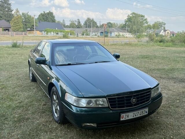 Кадиллак СТС 2003 в Изюме на Automoto.ua Зеленый Кадиллак СТС, объемом двигателя 4.6 л и пробегом 231 тыс. км за 4000 $, фото 1 на Automoto.ua