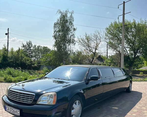 Черный Кадиллак ДеВиль, объемом двигателя 4.57 л и пробегом 150 тыс. км за 6555 $, фото 1 на Automoto.ua