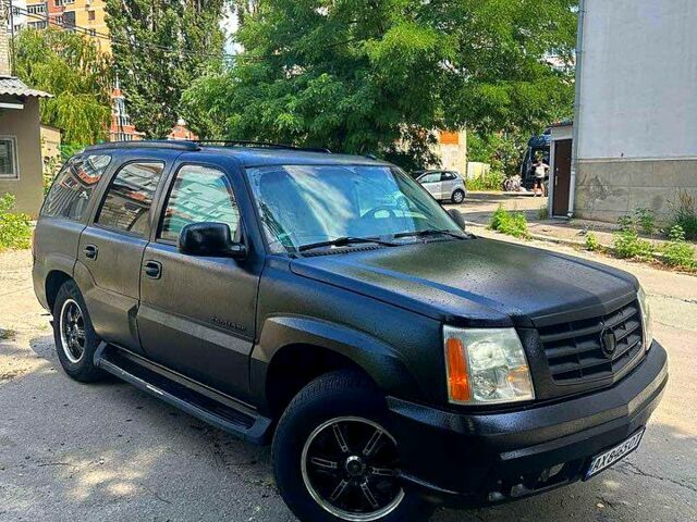 Черный Кадиллак Эскалейд, объемом двигателя 6 л и пробегом 100 тыс. км за 13200 $, фото 1 на Automoto.ua