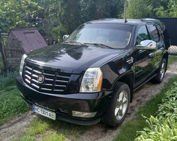 Чорний Каділак Ескалейд, об'ємом двигуна 6.2 л та пробігом 115 тис. км за 12500 $, фото 1 на Automoto.ua