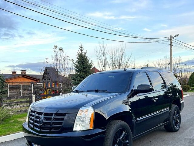Чорний Каділак Ескалейд, об'ємом двигуна 6.2 л та пробігом 156 тис. км за 15000 $, фото 1 на Automoto.ua